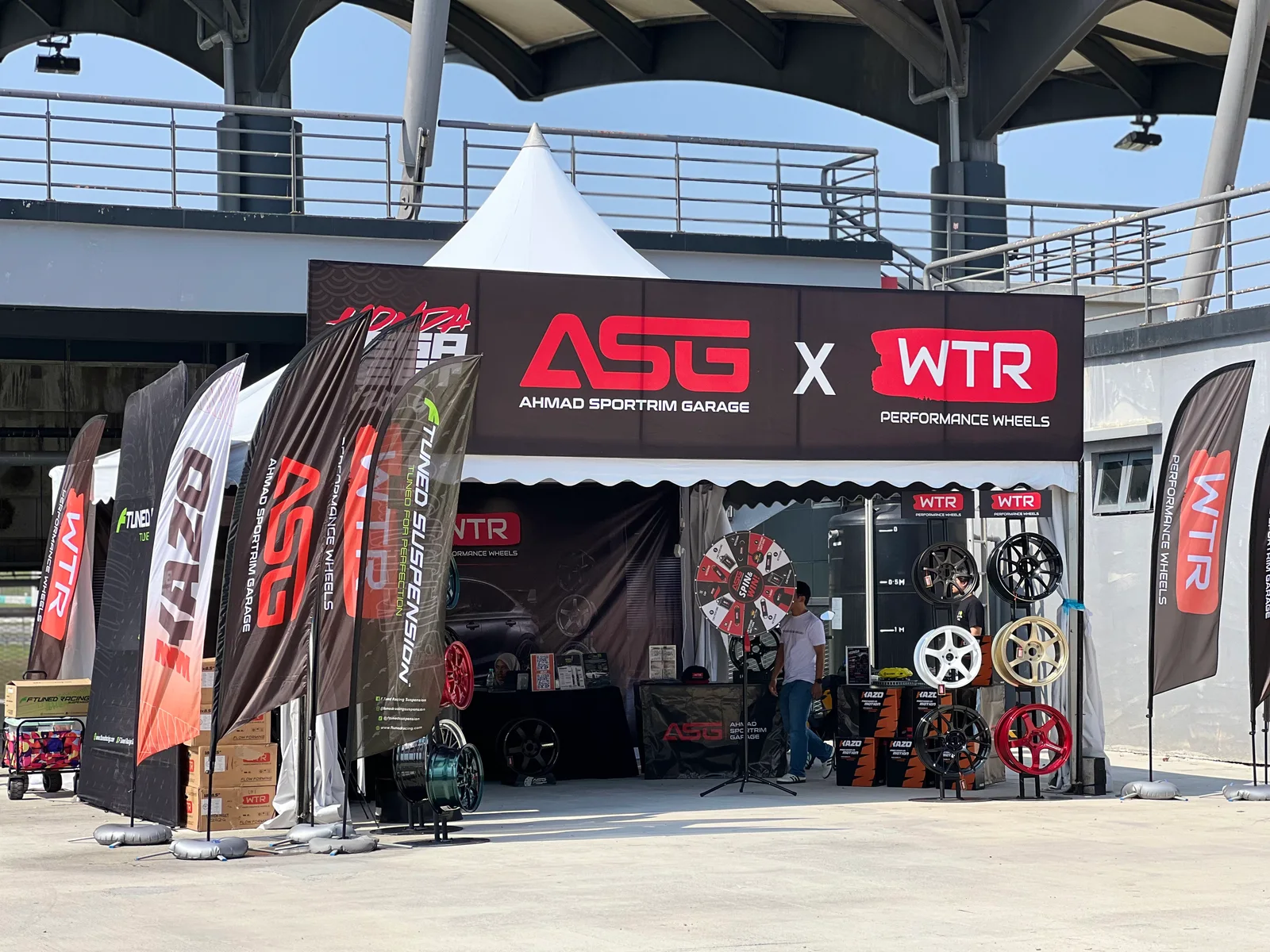ASG and WTR performance wheels booth at a community car event