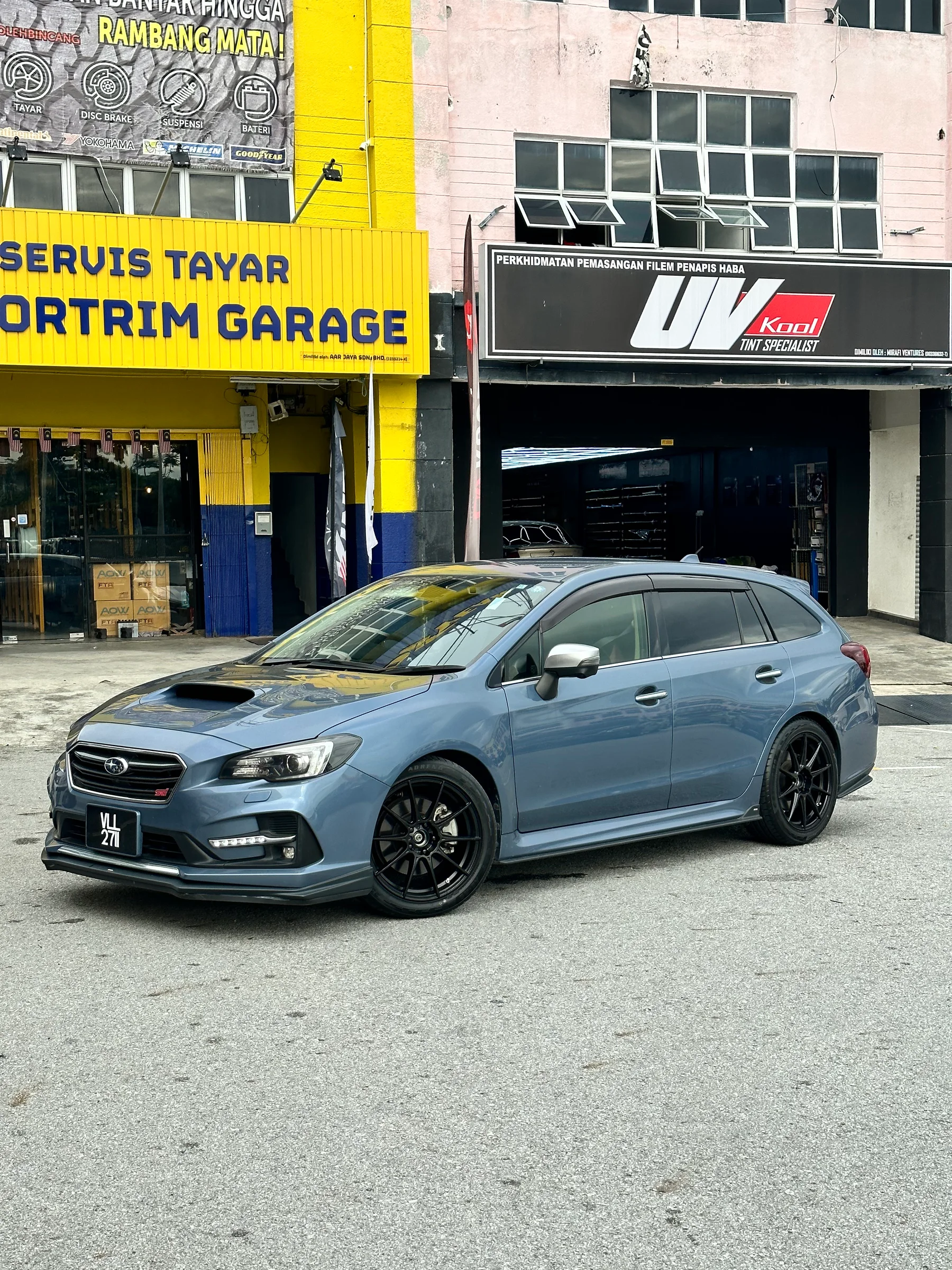 Blue Subaru Levorg with black multi-spoke wheels outside Ahmad Sportrim Garage