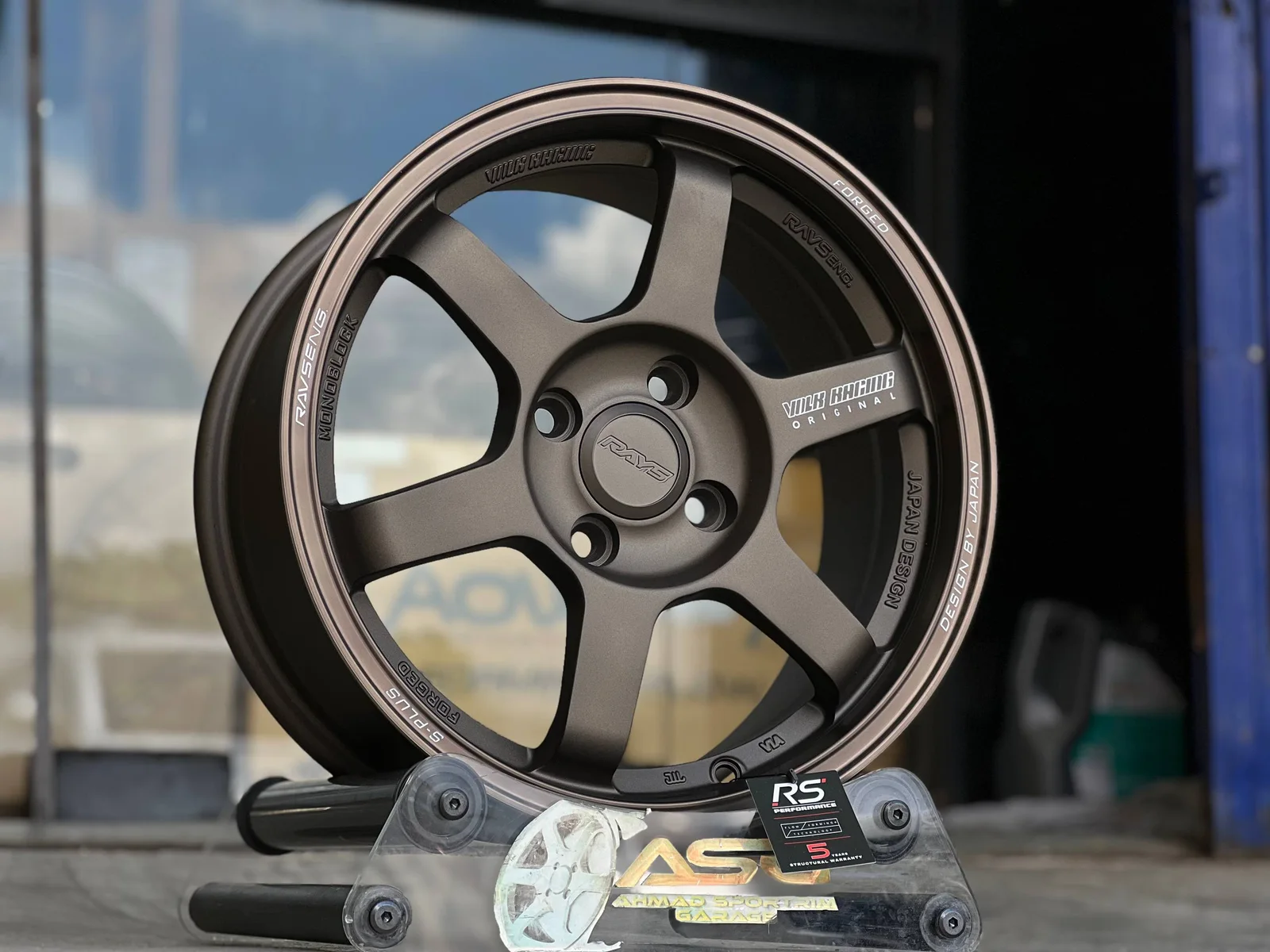 Bronze six-spoke 15-inch sport rim displayed at Ahmad Sportrim Garage