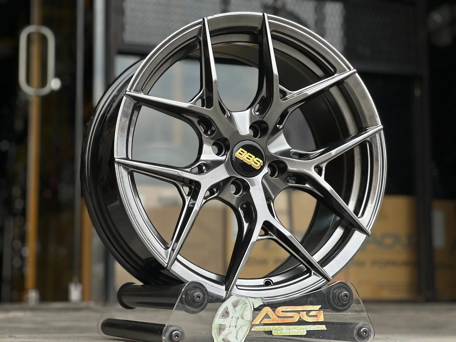 Dark split-spoke 17-inch sport rim displayed at Ahmad Sportrim Garage