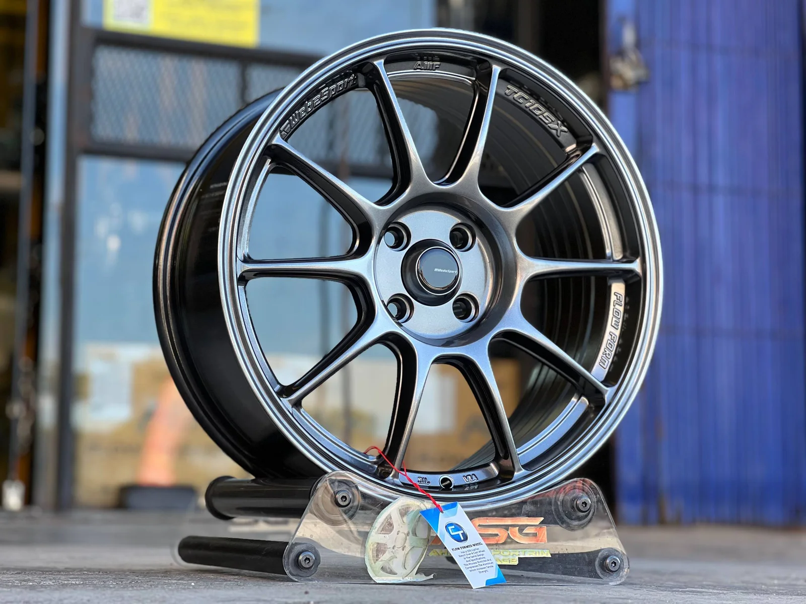 Dark multi-spoke 17-inch sport rim displayed at Ahmad Sportrim Garage