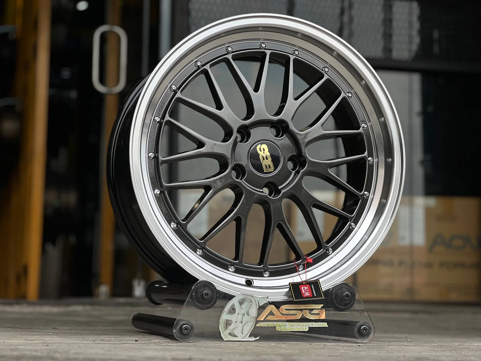 Dark mesh 18-inch sport rim displayed at Ahmad Sportrim Garage