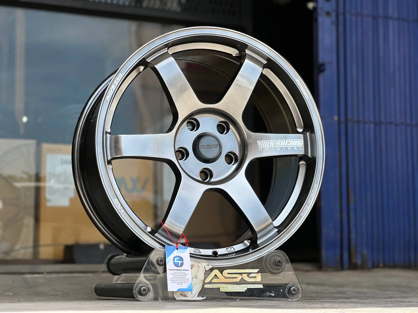 Machined silver five-spoke 18-inch sport rim displayed at Ahmad Sportrim Garage