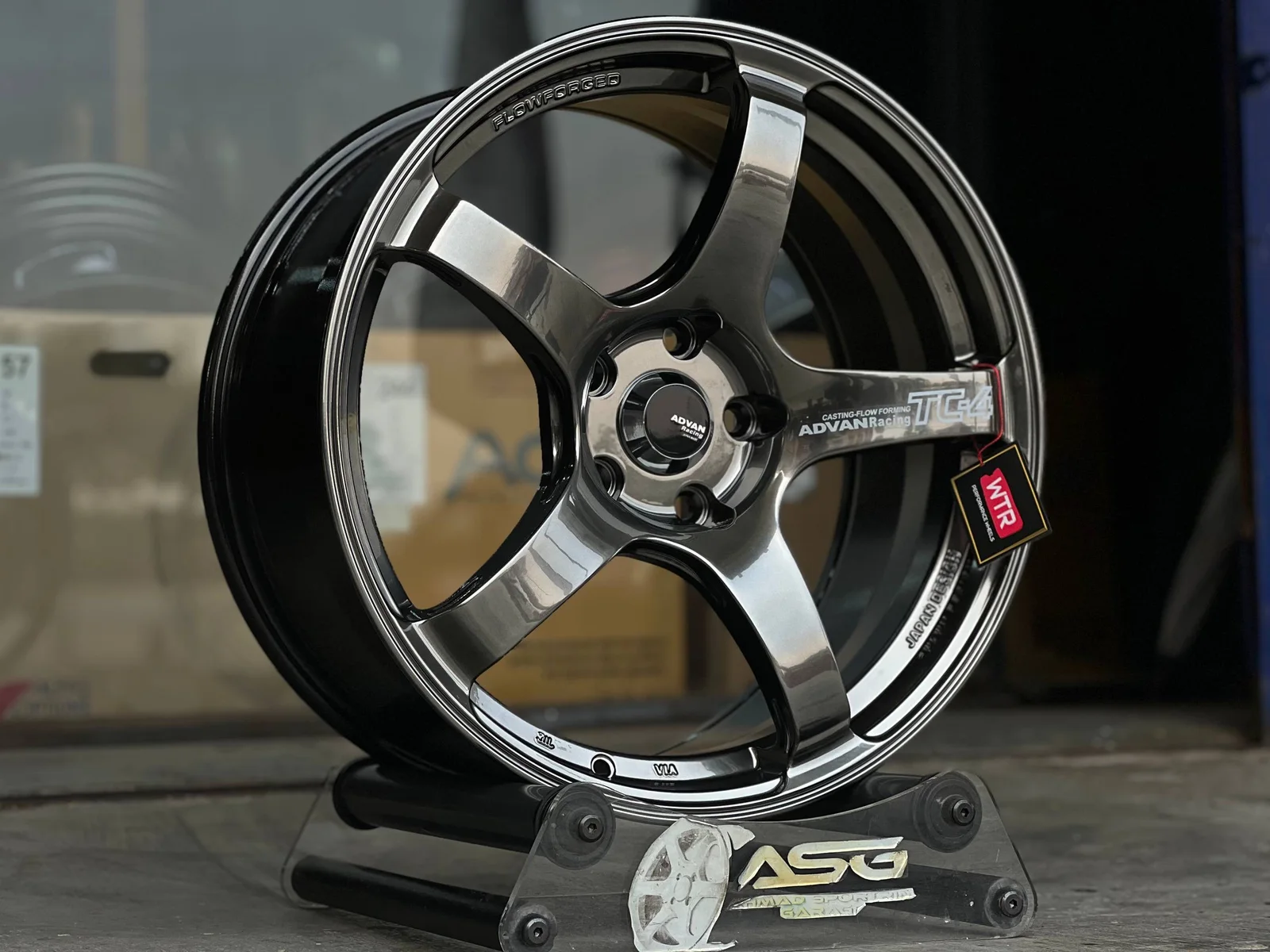 Dark five-spoke 18-inch sport rim displayed at Ahmad Sportrim Garage