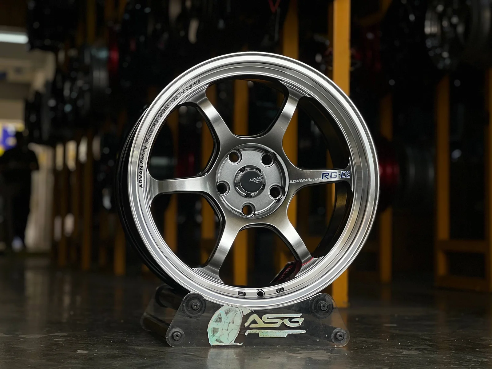 Bronze six-spoke 18-inch sport rim displayed at Ahmad Sportrim Garage