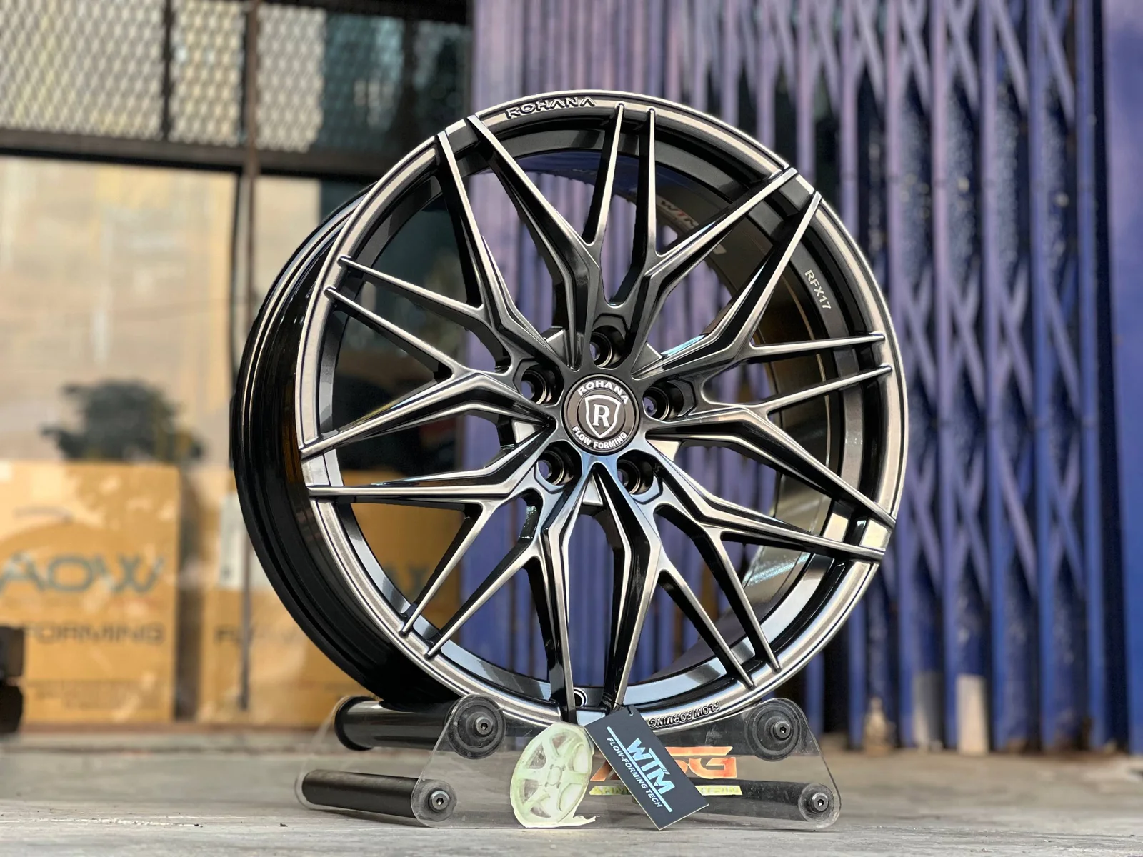Dark multi-spoke 19-inch sport rim displayed at Ahmad Sportrim Garage